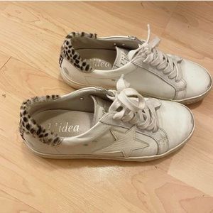 L’idea by Lori Distressed leopard fur sneakers